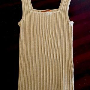 Gold lame blouse. Perfect for inside a jacket. Very stretchy fits M-L